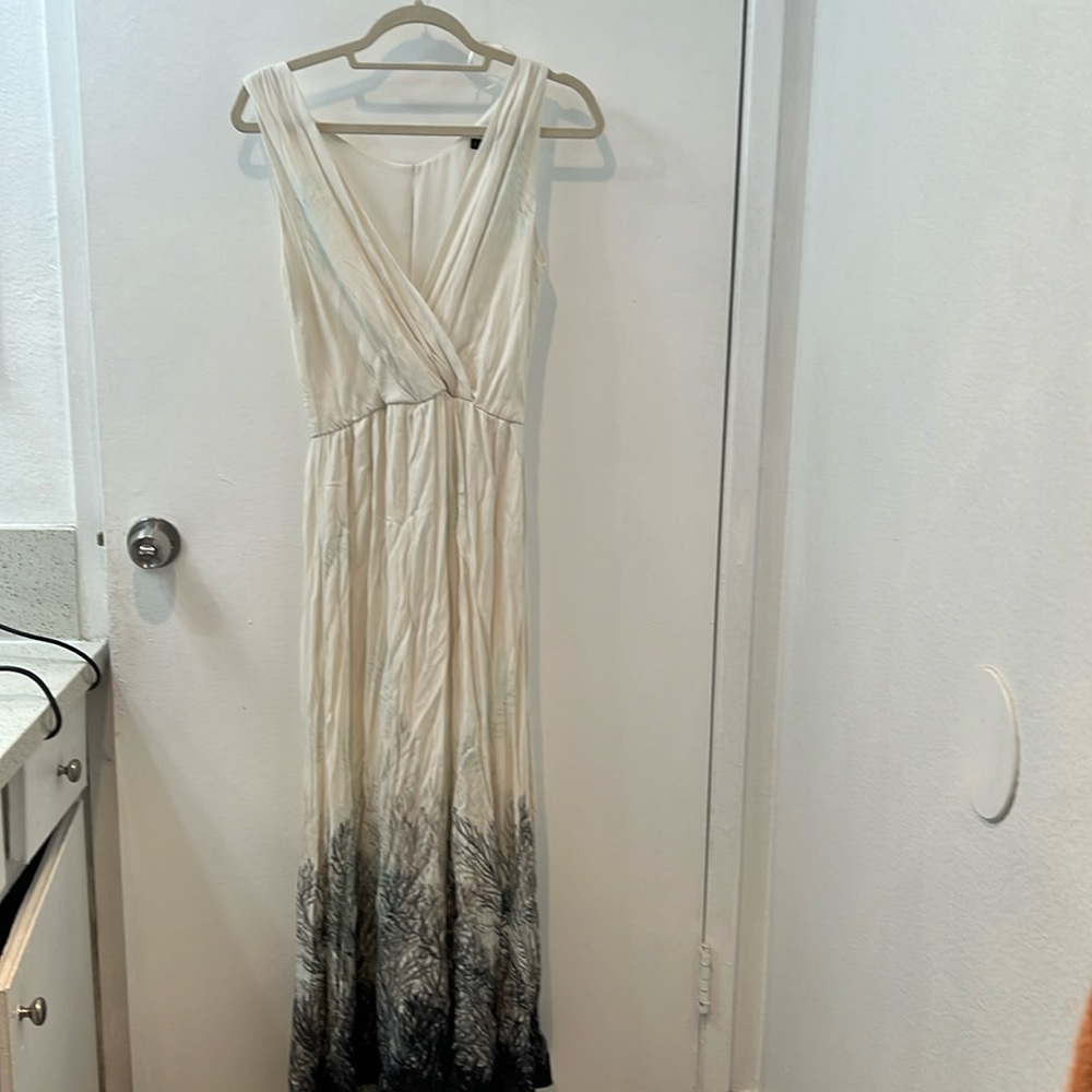 Coral print, Ivory aSleeveless, and back has opening